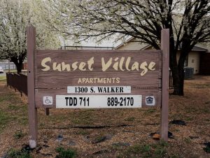 Sunset Village Apartments Sign