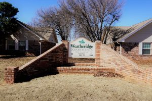 Weatheridge Apartments Sign